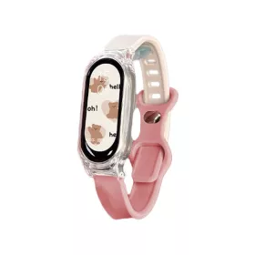   V bunke je text: ApriFit inteligentný náramok v broskyňovej farbe - Štýl a Technológia.